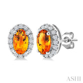 5x3 MM Oval Shape Citrine and 1/8 Ctw Round Cut Diamond Halo Semi-Precious Stud Earrings in 10K White Gold