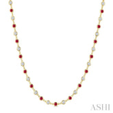 2.85 MM Round Shape Ruby and 2 5/8 Ctw Bezel Set Round Cut Diamond Precious Station Necklace in 14K Yellow Gold