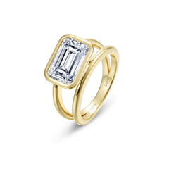 Floating Emerald Split Shank Ring