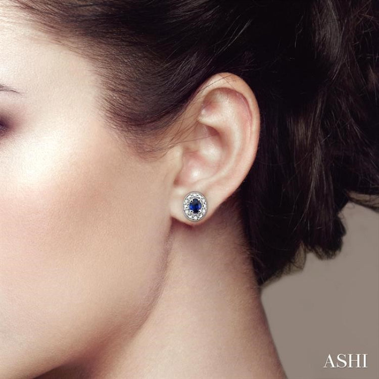 4X3 MM Oval Shaped Sapphire and 1/10 Ctw Round Cut Diamond Earrings in 10K White Gold