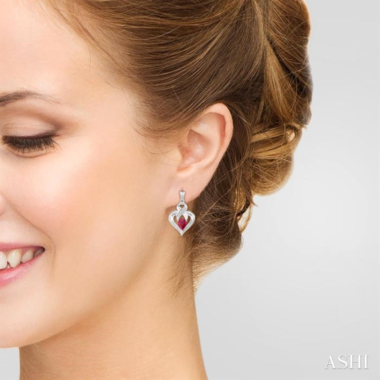 5x3 MM Pear Shape Ruby and 1/50 Ctw Round Cut Diamond Earrings in Sterling Silver