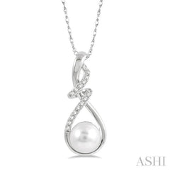 7 MM Round Shape Cultured Pearl and 1/10 Ctw Swirl Top Round Cut Diamond Fashion Pendant With Chain in 10K White Gold