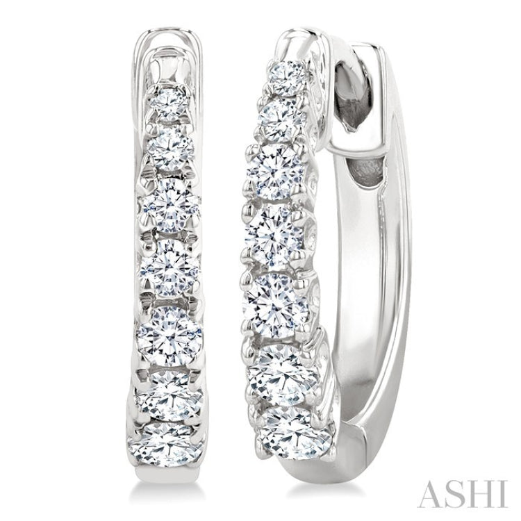 1/4 Ctw Graduated Round Cut Diamond Fashion Huggies in 14K White Gold